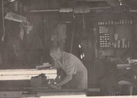 Ken Major working in the backyard shed in Netherby circa  1950s